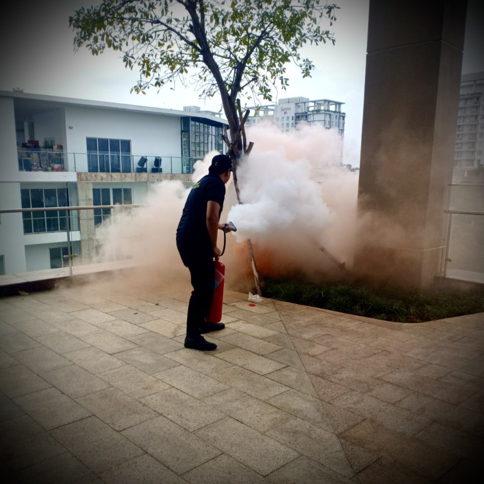 A picture containing building, truck, outdoor, redDescription automatically generated